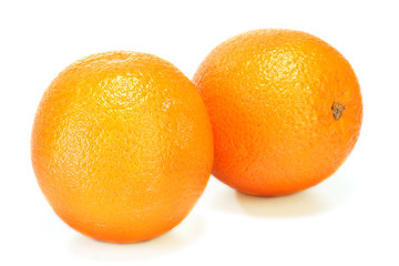 Fresh oranges on white