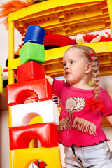 Fototapeta na wymiar Child play block and construction set in playroom.