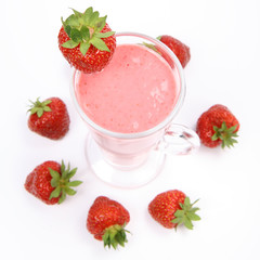 Strawberry shake in a glass decorated with strawberries