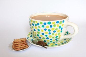 Giant tea cup and regular crackers
