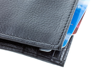 plastic cards in a black leather wallet