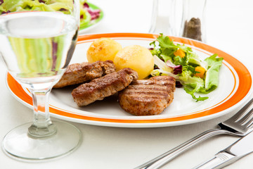 Grilled steaks and vegetables