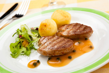 Grilled steaks and vegetables