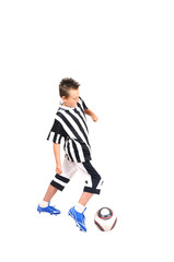 Young footballer with ball, isolated on white background