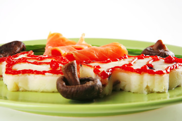 red salmon with mash on green