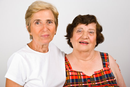 Elderly mother with mature daughter