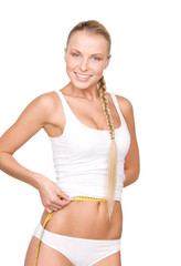 Obraz premium beautiful woman with measure tape