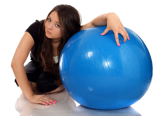 girl-teenager about a gymnastic ball.