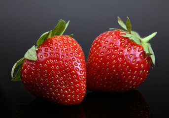 Strawberry berry on black