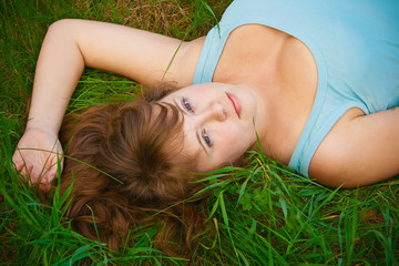 Obraz na płótnie Canvas Woman On A Grass