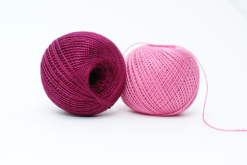 knitting with pink and purple yarn