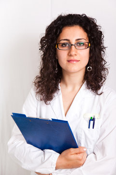 Female Doctor With Clipboard Her Hands