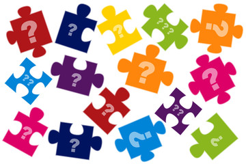 Bunte Puzzleteile mit Fragezeichen