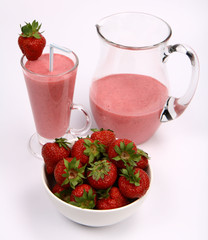 Strawberries in a bowl and strawberry shake