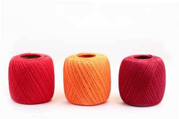 Three cotton spools