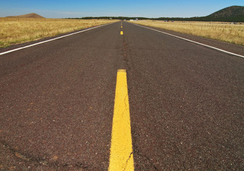 empty highway road along the grand canyon