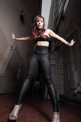 Obraz na płótnie Canvas Punk glam rocker chick in the alley