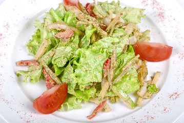 Salad of squid with roast chiken