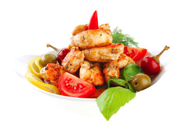 chicken chunks served with tomatoes