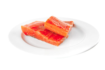 pink smoked salmon on white plate