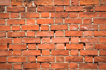 close-up of a red brick wall texture