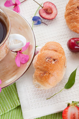 Breakfast. croissant with berries