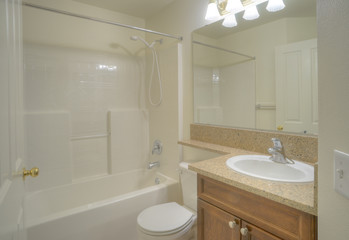 Contemporary bathroom with large mirror