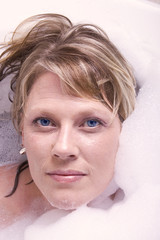 Woman Relaxing in the Tub