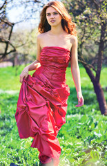 Young woman in red dress