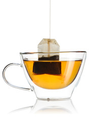 Teabag in the cup with hot water
