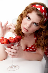 young Woman eating strawberries