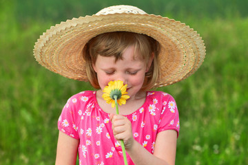 Kind mit Blume