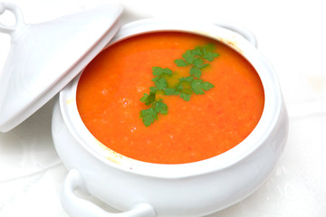 tomato soup in white bowl