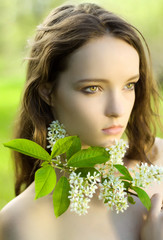 Naklejka premium young girl flower sensuality portrait outdoor