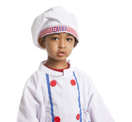 Toddler dressed as a chef