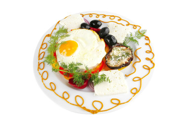 egg on white plate with vegetables