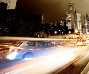 Obraz premium Fast moving cars at night