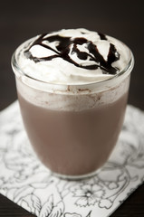 Hot chocolate drink with cream and sauce
