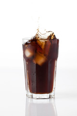 cola splash with ice