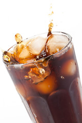 cola splash with ice