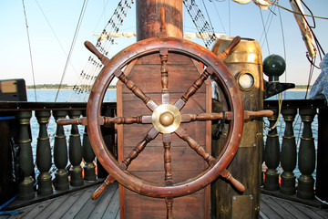 Old ship steering rudder helm