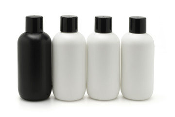 Black and white cosmetic containers