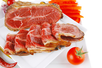 beef rolls and chunk on white