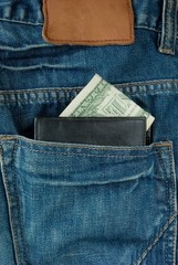 jeans pocket and money in purse.