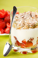 yogurt with cereal and strawberries