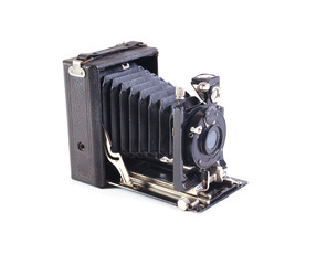 Old plate camera on a white background.