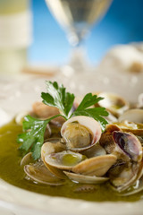 clam soup on dish - zuppa di vongole