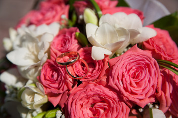Wedding rings on a bouquet