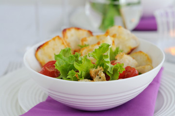 roasted tomatoes and haloumi salad