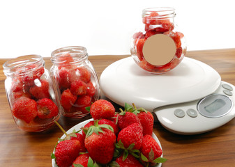 Strawberries in bowl on the scales